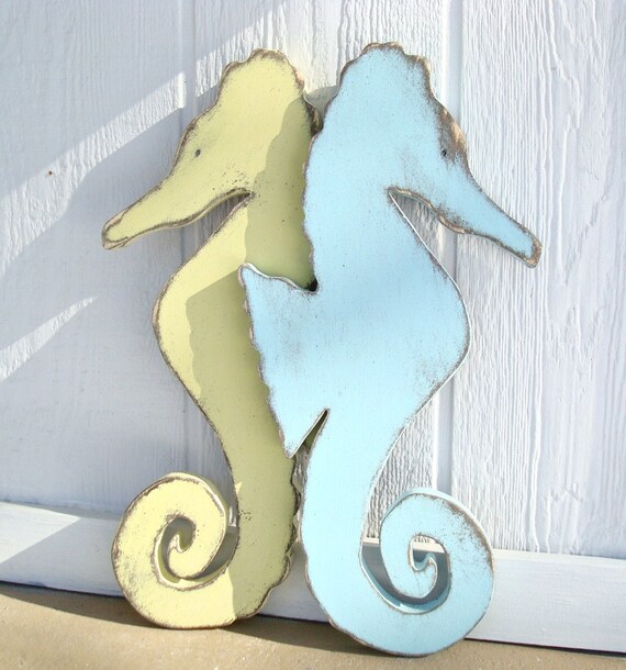 painted nautical seahorse wood wall art by folkybirdsandfish