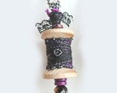 Spool Pendant with Black Felt Wrap