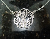 monogram necklace.  1''size,with 10cz pave' setting ,sterling silver monogram. with a chain.
