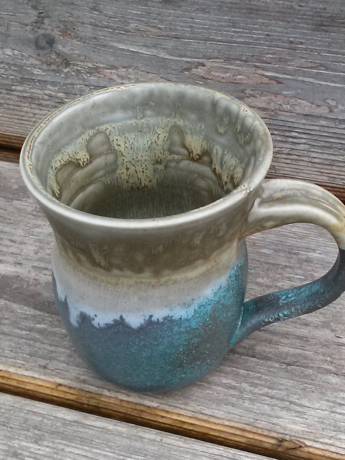 Pottery mug in aqua blue and eggshell blue
