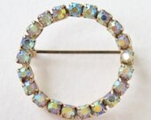 Vintage 60s Hollywood Regency Retro Goldtone Gold Tone Prong Set Blue Aurora Borealis Rhinestone Circle Pin Brooch