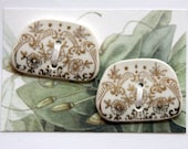 2 Angular Buttons- white and gold china PB316