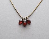 no. 145 - carved rhodolite garnet leaves on vintage brass chain