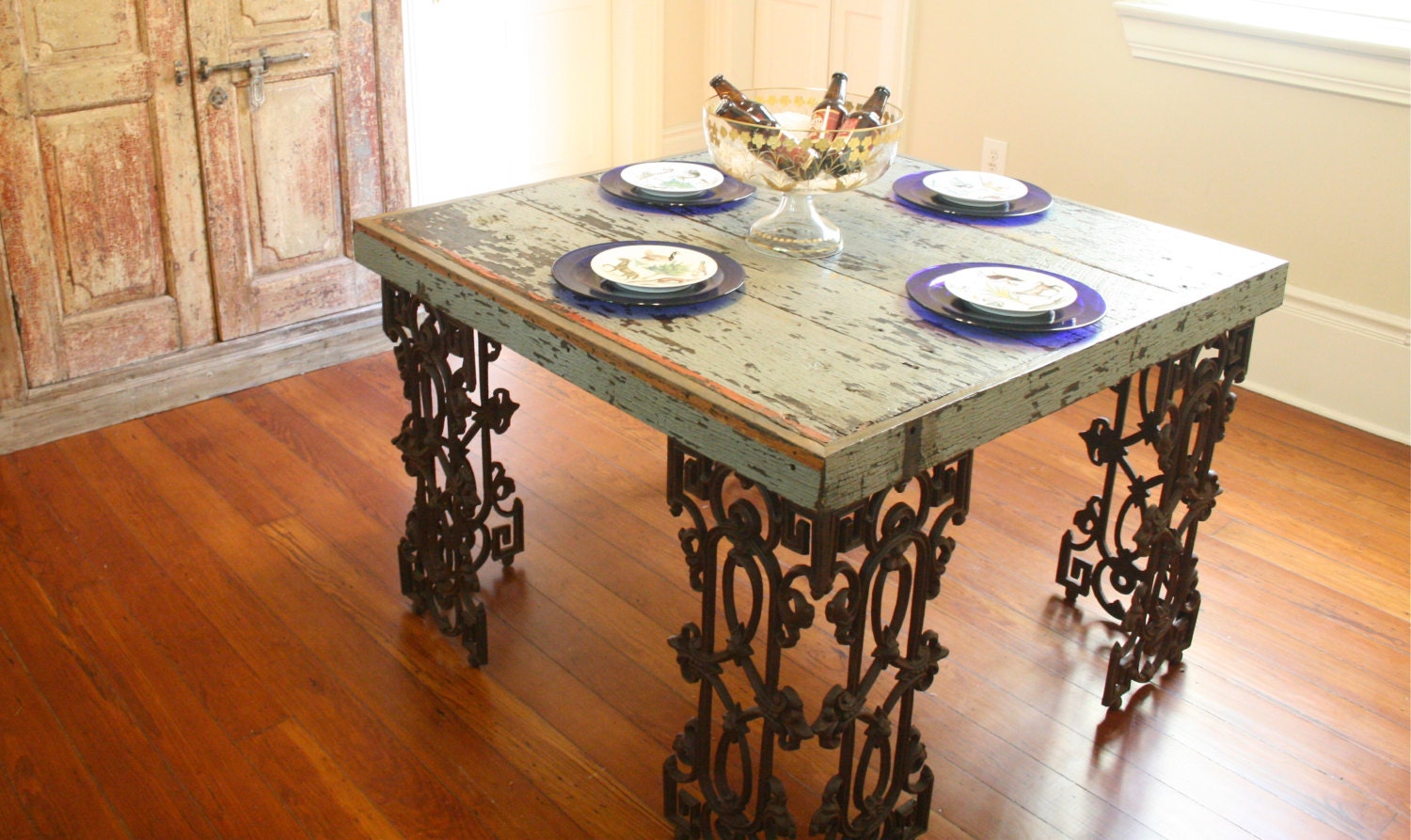 New Orleans Dining Room Table Made From Distressed Wood and Wrought Iron