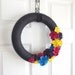 Spring Yarn Wreath. Charcoal Grey, Raspberry Pink, Purple, Aqua Blue, and Yellow Felt Flowers. Spring home decor, May Flowers.