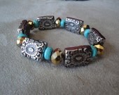 Stretch Bracelet with Antique Silver Turqoise and Sparkly Gold Beads