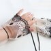 Fingerless Bridal Gloves: Whimsical Wrist Cuffs of Tan Colored Tulle Embroidered with Black and White. Handmade and Unique Design