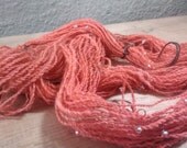 HAND Spun salmon colored wool and mohair yarn, spun with glass beads