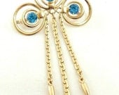 Aqua Rhinestone Brooch with Gold Tone Chain Tassle