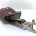 Extremely convenient keychain key holder from dark brown cowhide. Holds 6-8 regular keys, free monogramming , personalized/ belt hanger