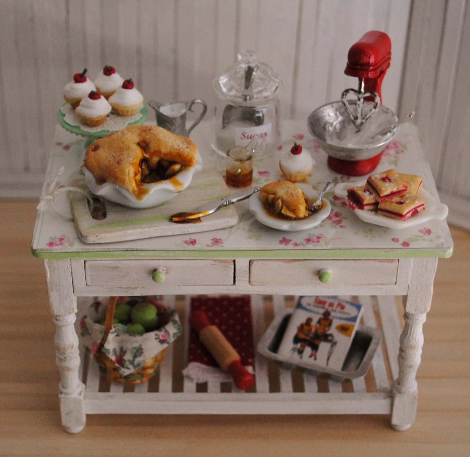 Miniature Baking Table Filled With Goodies For Your Dollhouse Kitchen - An Apple Pie, Cherry Cupcakes, A Red Mixer, And More