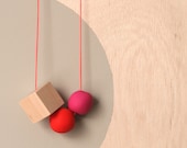 and a cube makes a necklace