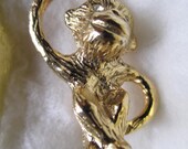 Vintage Gold Tone Monkey Pin with Rhinestone eyes.