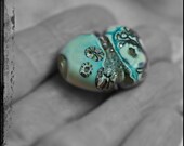 Artisan made glass bead..'davy jones'  lampwork bead sra