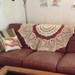 Ornate doily lap blanket in "Elemental Achievement"