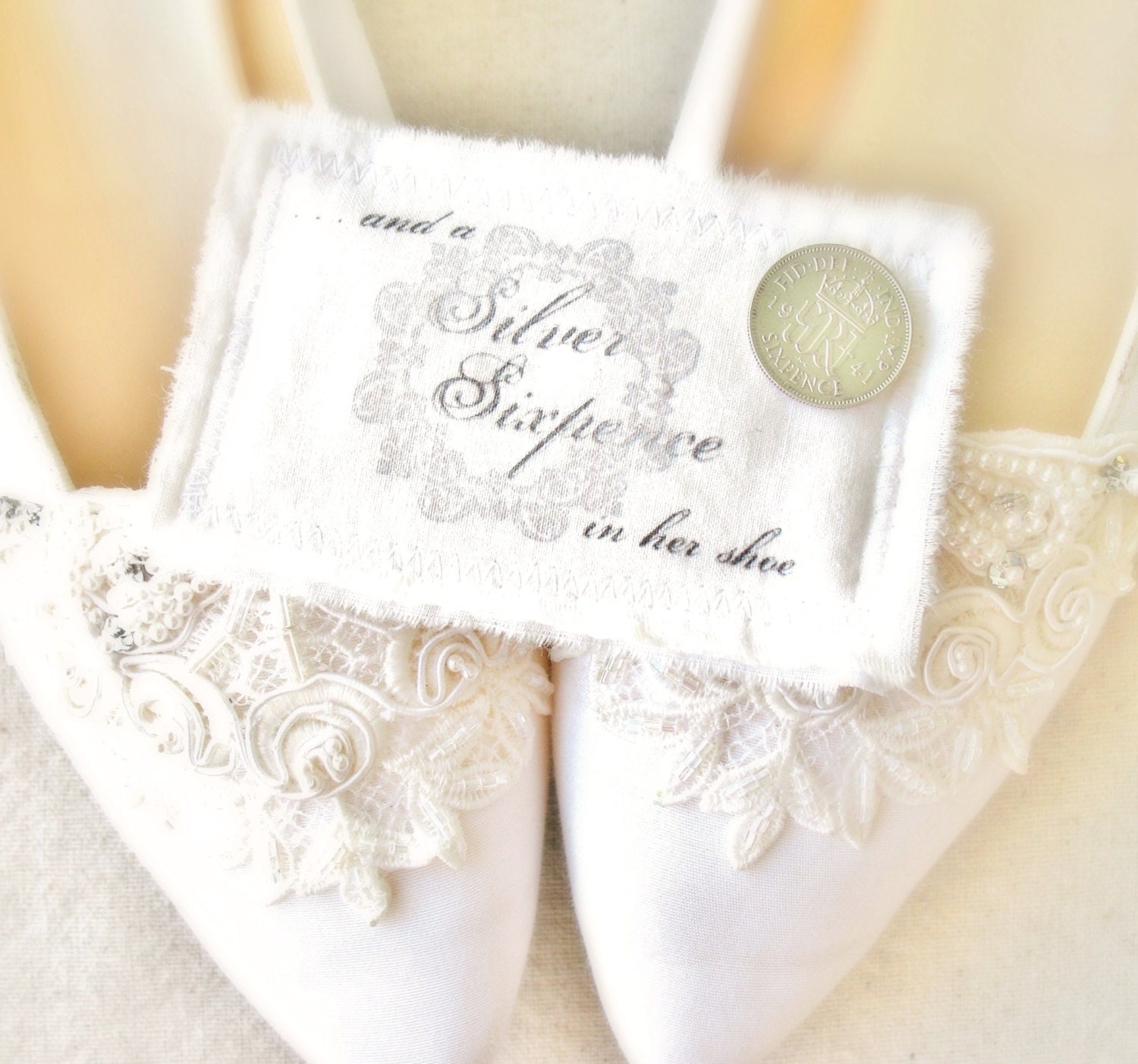 a silver sixpence in her shoe . CROWN . vintage sixpence coin piece with handmade cotton pouch . Keep Calm and Carry On