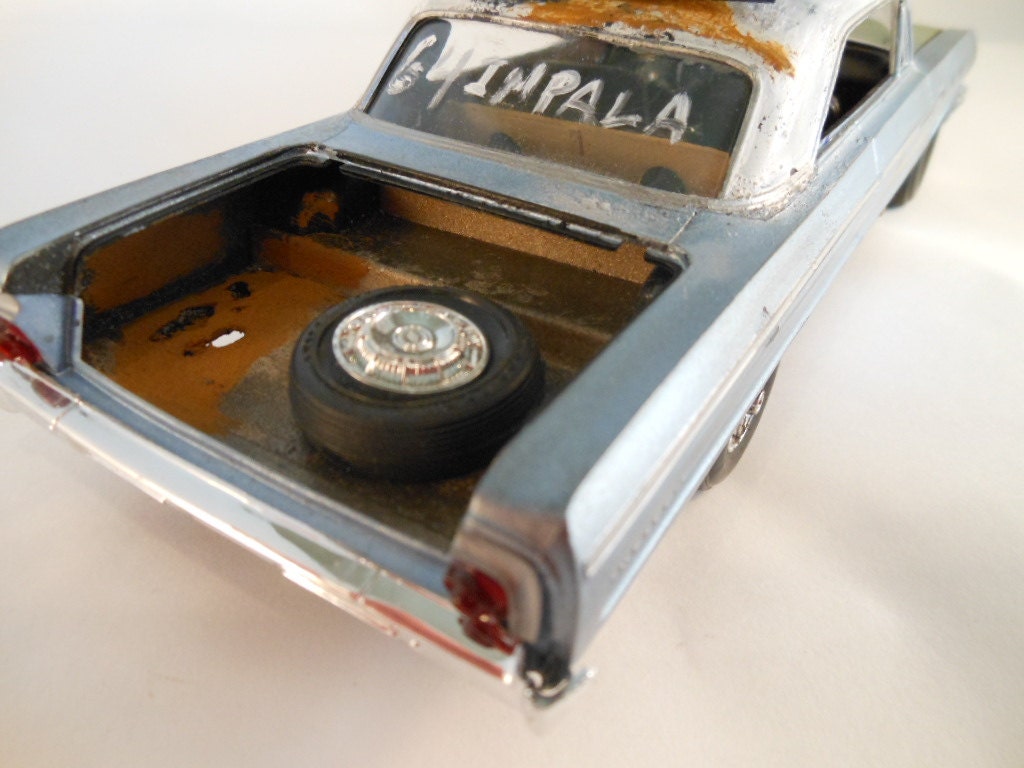 1964 Chevy Impala 1/24 scale model car in blue