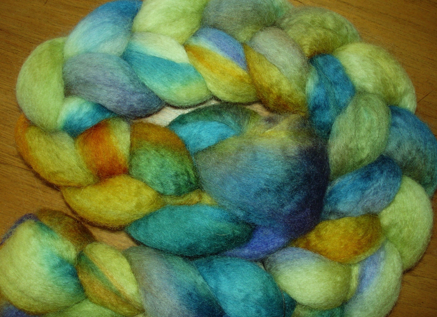 Hand Painted Blue Faced Leicester Wool Top, Pale Yellow, Soft Gold, Turquoise, Purple, Golden Pear Green. 2.8. oz
