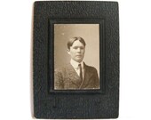 Antique Sepia Photograph Of A Dapper Young Man In High Collar