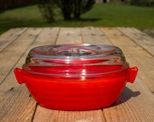 Red oval glass covered casserole Phoenix Sprayware