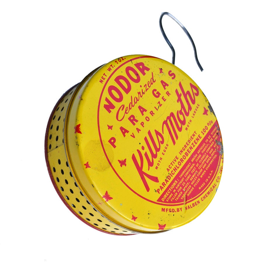 vintage tin moth vaporizer with hanger  offered by Elizabeth Rosen