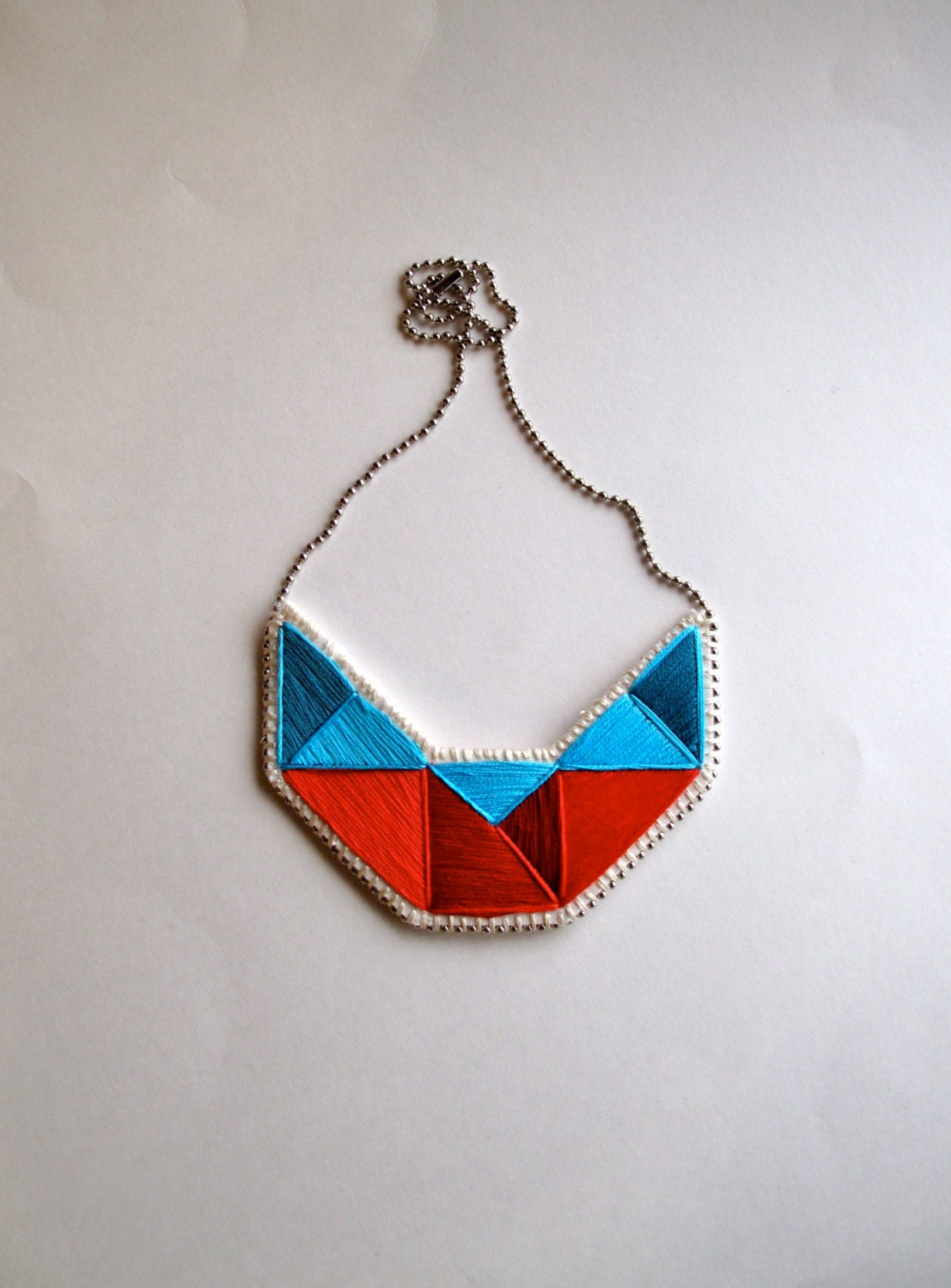 Embroidered geometric statement bib necklace in reds and blues Summer fashion
