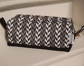 Black and white boxy toiletry bag made out of cotton