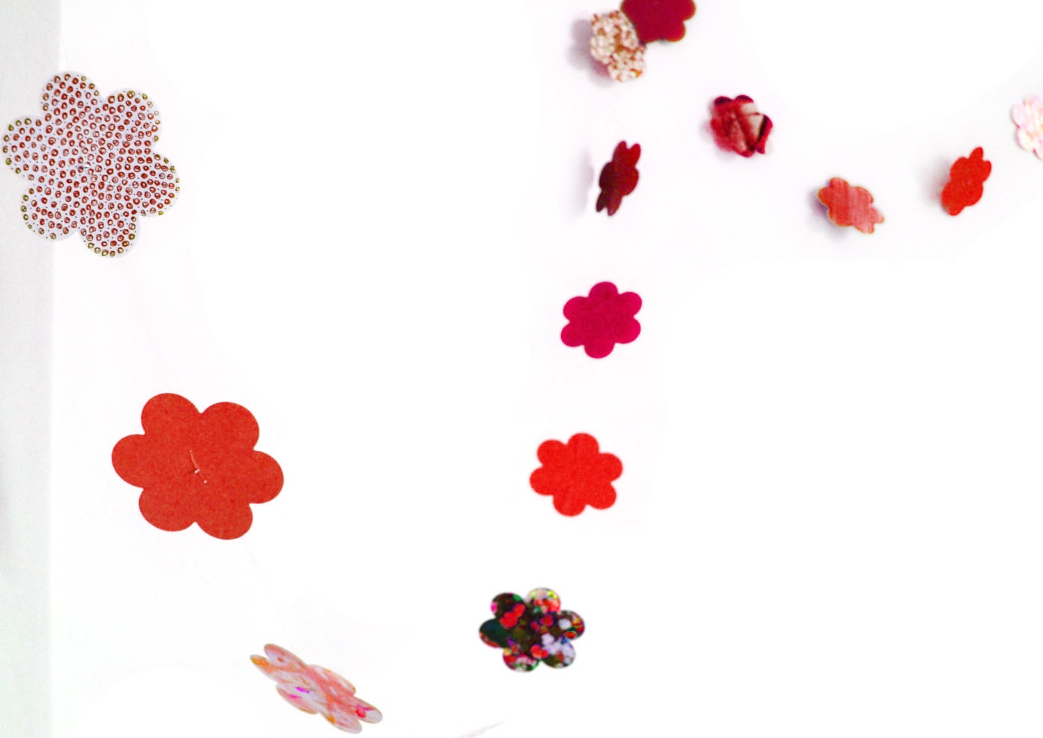 Red garland in cardboard flowers