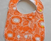 Tangerine and White Flowered Adjustable Side Snap Bib