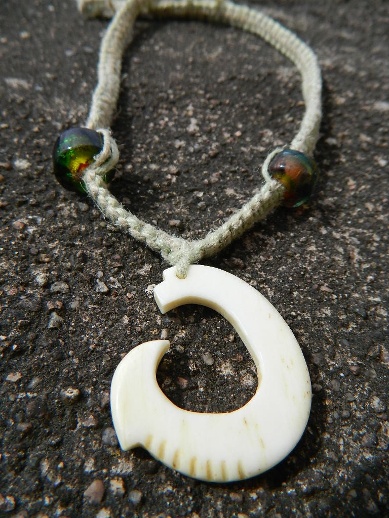 Hand Carved Bone Fish Hook with Rainbow Glass Beads on Hemp