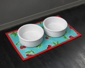 Turquoise Tossed Cherry Print with Red Border Water Proof Pet Placemat