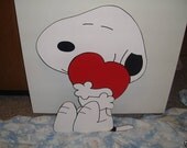 Snoopy Holding a valentine yard art 28 inches