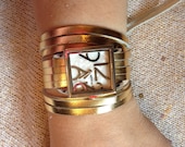 Gold leather wrap watch