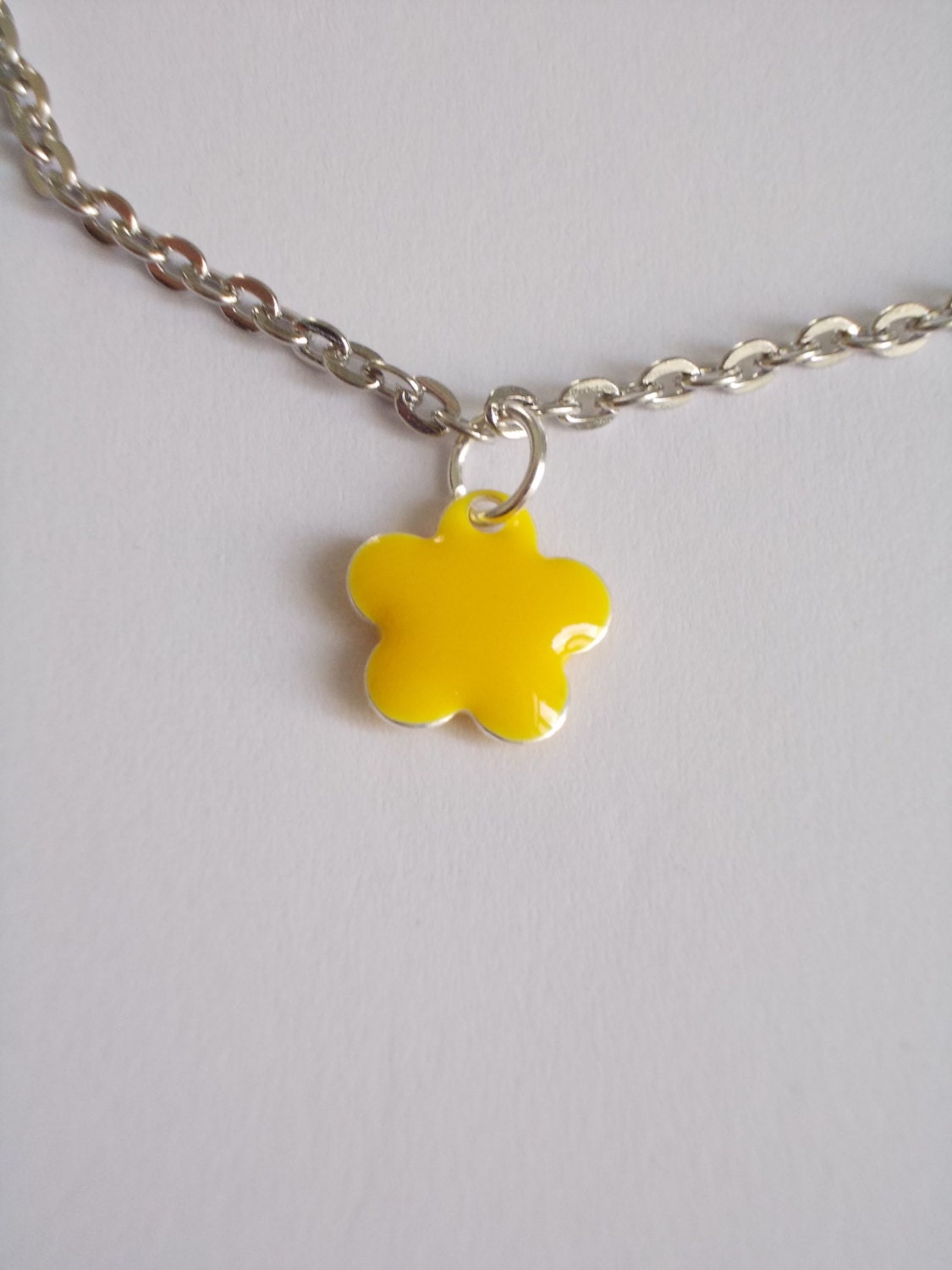 Flower yellow sunshine enamel bracelet. Metal silver chain.