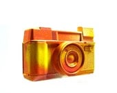 retro camera, graffiti art, altered object, yellow, neon, orange, paint splatter, 80s, hipster, vintage camera, home decor