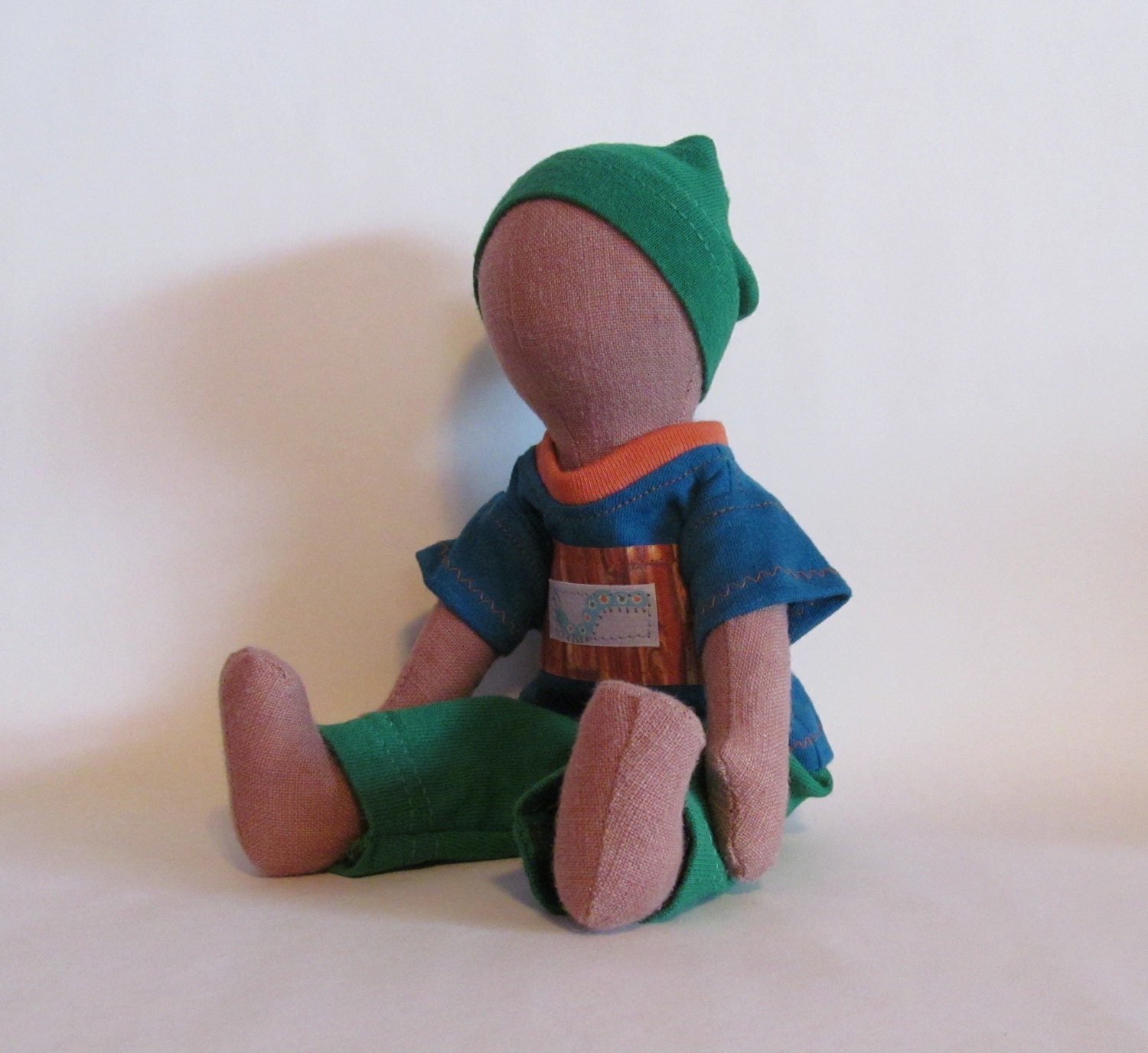 Eco-friendly light brown 11" doll with caterpillar t-shirt outfit