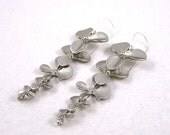 20 % VACATION SALE Modern sleek stylish matte silver flower earrings