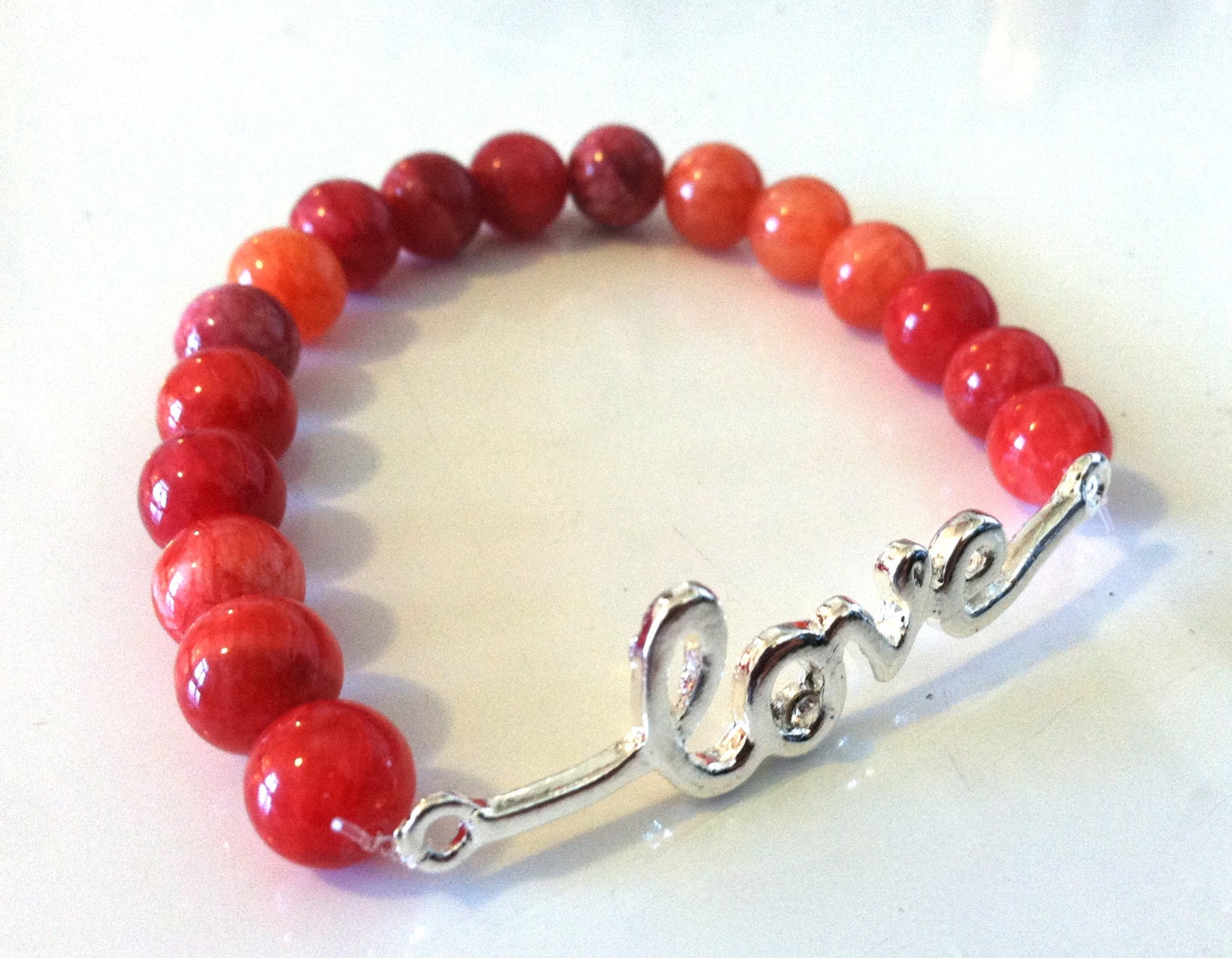 Ruby dyed quartzite script love bracelet