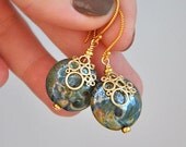 Earrings lampwork, gold plated, silver over, space