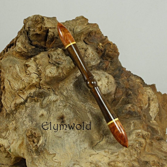 Double ended hair stick .   Handmade from Queen ebony and red mallee burl.