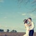 Capped sleeve low back fitted French lace wedding dress