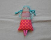 Handmade doll with embroidered face and body