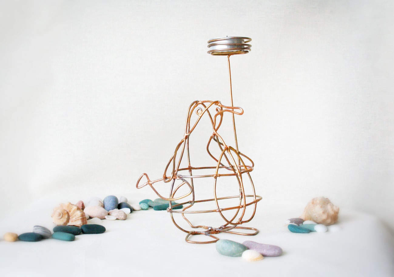 Handmade wire penguin candle holder