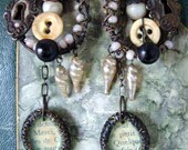 assemblage in black and white rustic-mixed-media-french-text-keyhole-pearl-vintage-button earrings by Anvil artifacts