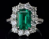 Superior natural Columbian emerald and diamond spectacular ring