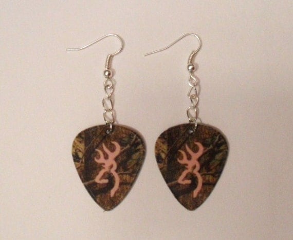 Mossy Oak Camo with light pink browning deer symbol guitar pick earrings
