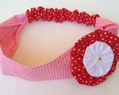 Handmade pink and red polka dot headband with coordinated yo-yo fabric flower. Spring celebration gift, girly hair accessory