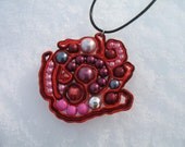 Red, orange soutache pendant with beads