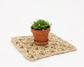 Chunky crocheted table centre piece in thick natural jute