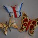 three vintage enamel butterfly brooches W Germany